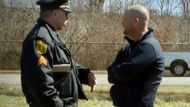 Wesley Hadsell with a police officer. (Screenshot from Dateline Episode Trailer: The Jacket/Dateline NBC on YouTube)